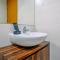 Fully Furnished Apartment with Comfortable Design 1BR Woodland Park Residence By Travelio