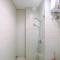 Fully Furnished Apartment with Comfortable Design 1BR Woodland Park Residence By Travelio