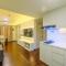 New Furnished and Minimalist 3BR at Meikarta Apartment By Travelio