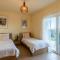 Casa Laranja, Aromas Burgau