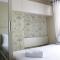 Comfortable 2BR Apartment at Grand Asia Afrika Residence near Alun Alun Bandung By Travelio