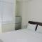 Comfort Studio at Green Pramuka City Apartment near Shopping Center By Travelio
