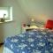 Attractive holiday home with jetty - Steendam