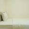 Comfy and Modern 2BR at Meikarta Apartment By Travelio