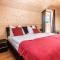 Heidi Chalets Falkertsee - Luxuschalet Bergwinter