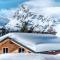 Heidi Chalets Falkertsee - Luxuschalet Bergwinter