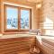 Heidi Chalets Falkertsee - Luxuschalet Bergwinter
