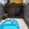 Casa Duplex Iriri - Banheira e Piscina