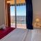 Sunrise Beachfront Apartment by the Marina
