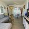 Sunrise Beachfront Apartment by the Marina