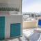 Bild des Welcomely - Panoramic attic room - Cala Gonone