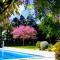 Stil Mar Anna Sol - Jardín y Piscina by Stil Mar Anna