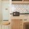 Comfort 2BR Green Pramuka City Apartment near Shopping Center By Travelio