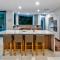 Pavillions 11 on Hamilton Island, waterfront apartment with private pool and buggy