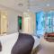 Pavillions 11 on Hamilton Island, waterfront apartment with private pool and buggy