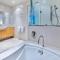 Pavillions 11 on Hamilton Island, waterfront apartment with private pool and buggy