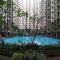 Stylish & Strategic 2BR at Gateway Ahmad Yani Cicadas Apartment near Mall By Travelio
