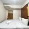 Stylish & Strategic 2BR at Gateway Ahmad Yani Cicadas Apartment near Mall By Travelio