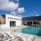 Luxe gezinsvilla met zeezicht Jan Thiel villa Grey Noble