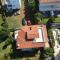 Τraditional fully detached villa on a luxurious hillock of Thessaloniki with its own garden also for family & wedding gatherings for 10 to 25 people only 15 minutes from airport