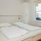 4 person holiday home on a holiday park in Ebeltoft