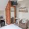 Toothbrush Rooms at Lattice Lodge - Guest Kitchen & EV Recharging