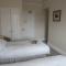 Toothbrush Rooms at Lattice Lodge - Guest Kitchen & EV Recharging