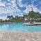Modern River Strand Country Club Condo with Pool! - 布雷登顿