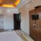 Hotel Mudra Midtown Suites & Rooms