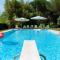 One bedroom villa with shared pool enclosed garden and wifi at Pisa