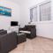 Apartmani Mlačić