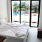 Apartments Stamopolu Lux with pool view