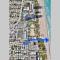 Serenity at Seascape: Steps to the beach & Shops - Palm Beach Shores