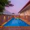 StayVistas V Square - Enjoy a pool and indoor games for a leisurely stay