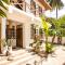 KIMA Serviced Beach House & Suites