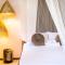 KIMA Serviced Beach House & Suites