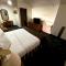 Woodland Inn & Suites