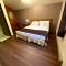 Woodland Inn & Suites