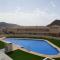 Casas Nuestras II Andalucia La Envia Golf piscinas de verano y climatizada en invierno, fitness center wifi y parking disponible con reserva