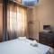 Τraditional fully detached villa on a luxurious hillock of Thessaloniki with its own garden also for family & wedding gatherings for 10 to 25 people only 15 minutes from airport