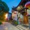 Lijiang Gui Yuan Tian Ju Guesthouse - ليجيانغ