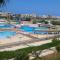 1B studio 2beds air conditioned basement114 green beach - العلمين