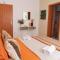 Apartment and Rooms Vilma