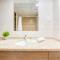 Sunny 1BR at Canal Residences West Dubai Sports City by Deluxe Holiday Homes