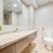 Sunny 1BR at Canal Residences West Dubai Sports City by Deluxe Holiday Homes