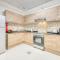 Sunny 1BR at Canal Residences West Dubai Sports City by Deluxe Holiday Homes