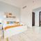 Sunny 1BR at Canal Residences West Dubai Sports City by Deluxe Holiday Homes