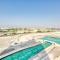 Sunny 1BR at Canal Residences West Dubai Sports City by Deluxe Holiday Homes