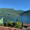 Cosy Penthouse with stunning view on Lugano Lake