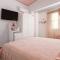 Marikas Deluxe Rooms
